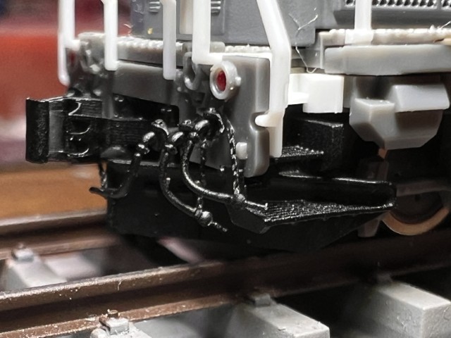 DE10前面グレードアップパーツ エアホース下部